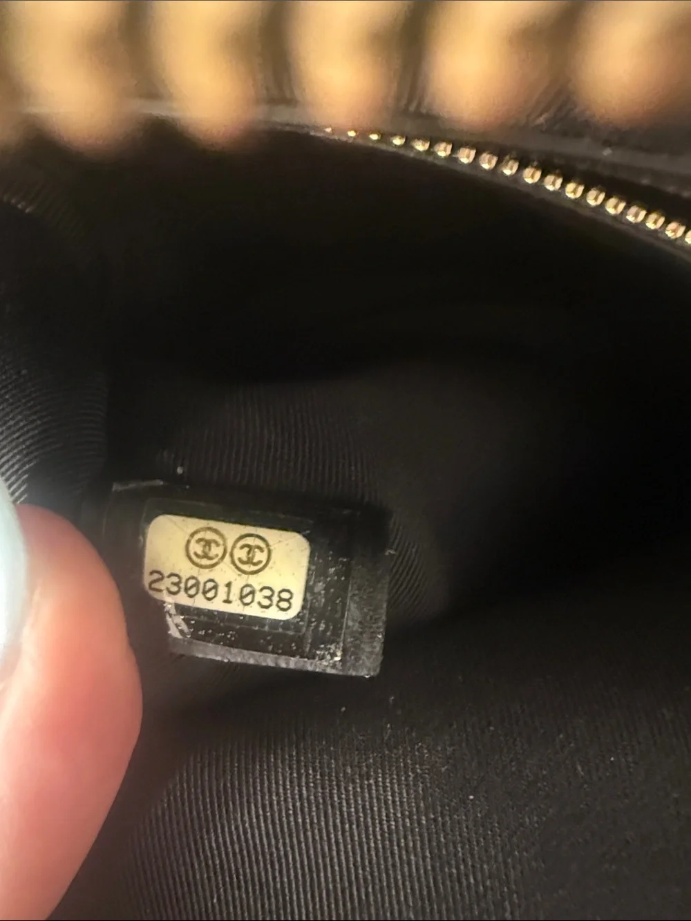 CHANEL Black Chevron Quilted Leather Zip Pouch with Gold CC